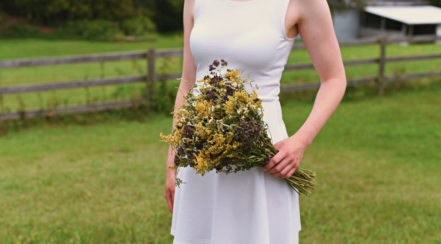 Bride holding dried bridal bouquet